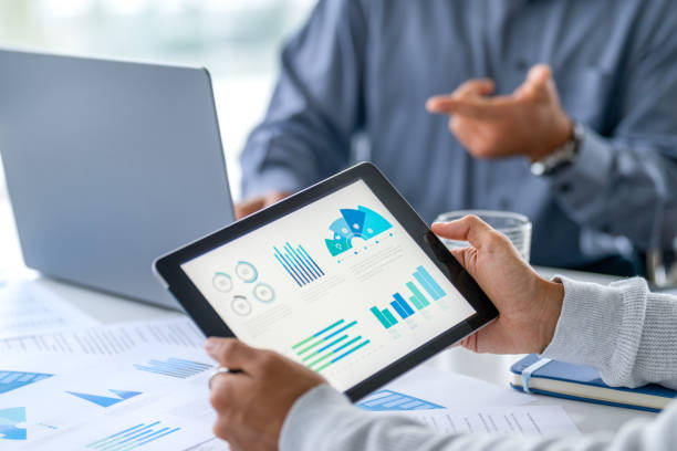 A data analyst reading the latest graphs on audience behavior patterns